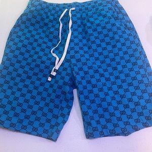 Gucci turquoise shorts XL. Fits more like a large. I’m a 34 and it fits 32